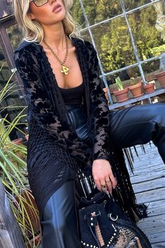 Fall means it’s kimono season - we don’t make the rules. Made from a black velvet burnout material with fringe cascading down the sleeves, the Stone Black Velvet Burnout Kimono is the boho chic finishing touch to all your fall time looks. Country Goth, Gothic Western, Fall Bottoms, Party Bottoms, Concert Dresses, 12th Tribe, Denim And Diamonds, Dresses Date Night, Bridal Tops