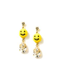 Wear a genuine smile with our Happy Horizons Earrings. The beaded smiley face charms will make any outfit feel brighter, and it will bring a positive vibe wherever you go. Shine on with this happy-go-lucky piece! 1.5" Gold plated brass earrings Crystal rhinestone post with butterfly clutch for pierced ears Beaded smiley charm Glass rhinestones Handmade in New York City and Puerto Rico. Due to the handmade nature of our products, some charms may vary in color and style or be replaced if unavailab Fun Dangling Beads Jewelry As Gift, Fun Dangling Beads Jewelry For Gifts, Fun Jewelry With Dangling Beads For Gift, Playful Smiley Face Jewelry For Everyday, Novelty Smiley Face Jewelry As Gift, Novelty Smiley Face Jewelry For Gifting, Novelty Smiley Face Jewelry For Gifts, Novelty Smiley Face Jewelry Gift, Cheerful Smiley Face Jewelry For Everyday