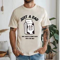 Just a Dad who Always Comes Back with the Milk T-Shirt: This classic unisex jersey short sleeve tee fits like a well-loved favorite. Soft cotton and quality print make users fall in love with it over and over again. These t-shirts have-ribbed knit collars to bolster shaping. The shoulders are tapered for a better fit over time. Dual side seams hold the garment's shape for longer.  .: Made with 100% Airlume combed and ring-spun cotton, a lightweight fabric (4.2 oz/yd² (142 g/m that is easy to lay Funny Screen Print T-shirt For Father's Day, Funny Father's Day T-shirt With Screen Print, Father's Day T-shirt With Funny Text In Relaxed Fit, Father's Day T-shirt With Funny Print In Relaxed Fit, Casual Father's Day Shirt With Screen Print, Casual Screen Print Shirt For Father's Day, Funny White T-shirt For Father's Day, Casual Shirt With Screen Print For Father's Day, Father's Day T-shirt With Funny Text And Crew Neck