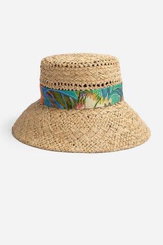 Crafted from 100% natural raffia, the Helena Bucket Hat offers additional protection from direct sun. Featuring a high crown encircled with a colorful fabric hatband, this hat is finished with a wide slanted brim to shield your eyes. Pair with colorful swimwear and a raffia beach bag for a polished poolside look. Johnny Was Women's Helena Bucket Hat in Natural Brown Panama Visor Hat For Beach Season Vacation, Beach Season Panama Hat With Visor For Vacation, Visor Panama Hat For Beach Season Vacation, Beach Season Visor Panama Hat For Vacation, Multicolor Sun Hat For Vacation And Kentucky Derby, Multicolor Sun Hat For Kentucky Derby Vacation, Multicolor Sun Hat For Vacation At Kentucky Derby, Kentucky Derby Woven Panama Hat In Toquilla Straw, Woven Panama Hat For Kentucky Derby