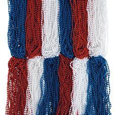 red, white and blue beads are hanging on the wall