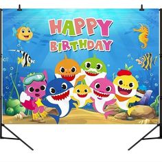 a happy birthday banner with cute little sharks