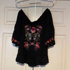 Nwt Women’s Umgee Off Shoulder Black Embroidered Top Size Small. Never Worn. Comes From Pet Free/Smoke Free Home. Casual Black Top With Embroidered Hem, Casual Black Embroidered V-neck Top, Casual Black Embroidered Top For Spring, Black V-neck Top With Floral Embroidery, Black Embroidered V-neck Top For Summer, Black Embroidered Hem Top For Summer, Spring Black V-neck Embroidered Top, Black V-neck Embroidered Top For Spring, Black V-neck Embroidered Top For Summer