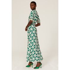 Green printed viscose (100% Viscose). Lining (100% Polyester). Hourglass. V-neck. Short sleeve. Back zipper closure. 56" from shoulder to hemline. Imported. Printed V-neck Rayon Maxi Dress, Green Viscose V-neck Maxi Dress, Printed Rayon V-neck Dress, Green V-neck Viscose Maxi Dress, Chic Printed Rayon Maxi Dress, Patterned Viscose Dresses For Summer, Summer Patterned Viscose Dresses, Green Rayon V-neck Dress, Printed V-neck Rayon Dress