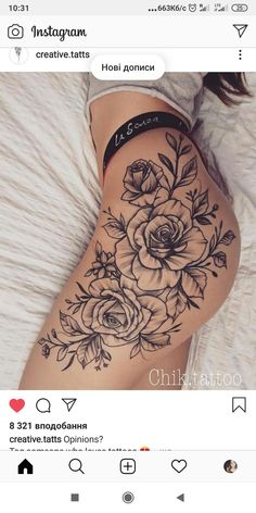 a woman's thigh with flowers on it and an instagramr above her