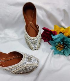 Introducing our exquisite Handmade Leather Khussa, inspired by the traditional footwear of Punjab, Rajasthan, Afghanistan, and Multan. These stunning juttis are perfect for weddings, bridal showers, formal meetings, and casual outings, making them an essential addition to any ethnic footwear collection. Each pair tells a story of cultural heritage and timeless elegance. Craftsmanship at Its Finest Our Handmade Leather Khussa juttis are meticulously handcrafted and embroidered by skilled artisans Traditional Jutti, Jutti Flats, Flat Pumps, Shoes For Girls, Punjabi Wedding, Womens Wedding Shoes, Yellow Leather, Pumps Flat, Bridal Gifts