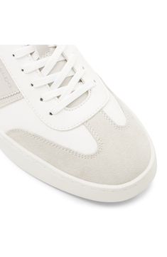 Signature logos and contrasting accents add street-savvy elements to a versatile sneaker grounded by a cushioned footbed and classic cupsole. Synthetic upper/textile lining/rubber sole Imported Suede Sneakers With White Sole And Embossed Logo, High-top Synthetic Sneakers With Embossed Logo And Round Toe, Synthetic High-top Sneakers With Embossed Logo And Round Toe, High-top Sneakers With Embossed Logo And Round Toe, Casual High-top Sneakers With Embossed Logo, White Textile Sneakers With Gum Sole, Textile Mid-top Sneakers With Contrast Sole, Urban Canvas Sneakers With Cushioned Footbed, White Suede Skate Shoes With Cushioned Footbed