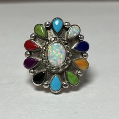 This Stunning Sterling Silver Ring Showcases A Beautiful Southwestern Style With An Array Of Colorful Gemstones. The Ring Is A Size 8.5 And Crafted With 925 Metal Purity. The Opal Is The Main Stone, Complemented By A Variety Of Other Gemstones, Making This Ring A Unique And Eye-Catching Addition To Any Jewelry Collection. The Multicolor Design Is Perfect For Those Who Appreciate The Beauty Of Gemstones And Want To Add A Touch Of Ethnic And Regional Style To Their Wardrobe. This Ring Is Perfect F Southwestern Multicolor Turquoise Ring, Multicolor Southwestern Sterling Silver Turquoise Ring, Multicolor Southwestern Style Turquoise Ring In Sterling Silver, Multicolor Southwestern Turquoise Sterling Silver Ring, Southwestern Multicolor Turquoise Sterling Silver Ring, Bohemian Turquoise Concho Ring, Southwestern Style Multicolor Oval Rings, Adjustable Multicolor Turquoise Ring In Southwestern Style, Vintage Multicolor Turquoise Ring