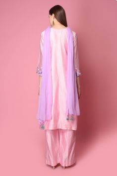 Pink straight long kurta with placement floral motif thread work and cutwork hem. Comes with pants and contrast tassel dupatta.
Component: 3
Embroidered
Neckine: V Neck
Sleeve Length: Three Quarter
Fabric: Kurta and Pant: Silk Chanderi; Dupatta: Chiffon
Color: Pink
Side slits
Tassel dupatta
Cutwork hem - Aza Fashions Diwali Organza Kurta With Embroidered Border, Organza Straight Kurta With Embroidered Border, Designer Organza Kurta With Embroidered Border, Unstitched Organza Kurta With Embroidered Border, Traditional Organza Kurta With Embroidered Border, Elegant Anarkali Set With Embroidered Border For Spring, Elegant Spring Anarkali Set With Embroidered Border, Spring Cotton Silk Dupatta With Embroidered Border, Spring Sharara With Sheer Dupatta