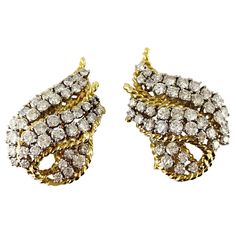 The earrings are finely crafted in 18k yellow gold with round diamonds weighing approximately total of 7.00 carat. Circa 1960. Antique Diamond, Van Cleef, Diamond Gemstone, Clip On Earrings, Round Diamonds, Diamond Jewelry, Vintage Designs, Vintage Antiques, Diamond Earrings