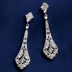 Ross-Simons - .15 ct. t. w. Diamond Openwork Drop Earrings in Sterling Silver. Jazz up your look with our embellished pair. The sterling silver vintage-style designs glitter with .15 ct. t. w. diamonds, boasting intricate openwork. Hanging length is 1 1/2". Post/clutch, diamond openwork drop earrings. Diamond birthstones are the perfect gift for April birthdays. Classic Chandelier Earrings With Diamond Accents For Evening, Classic Bridal Earrings For Evening, Ornate Diamond Accent Drop Earrings, Silver Crystal Earrings With Diamond Accents For Evening, Classic Crystal Bridal Earrings For Evening, Classic Evening Bridal Earrings In Crystal, Classic Diamond Earrings With Diamond Accents For Party, Classic Diamond Earrings With Accents For Party, Classic Silver Diamond Clip-on Earrings