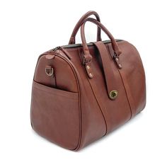 Elevate your carry-on with our newest bag the Travel Duffle. A bag that gets you anywhere you need to go, from the conference room to a weekend retreat, packing everything you need in style. Handcrafted in full-grain leather with antique brass hardware and storage compartments both inside and out. Complete with zipper closure, top strap buckle accent, smooth and sturdy handles, and removable crossbody strap. Details Double top handles Adjustable 54" crossbody strap Zipper and front clasp closure Travel Duffle Bag, Mens Travel, Travel Duffle, Antique Brass Hardware, Duffle Bag Travel, Storage Compartments, Leather Design, Brass Hardware, New Bag