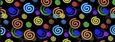 colorful spirals are shown in the dark, and it looks like they're going to