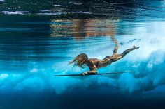 a woman on skis in the water