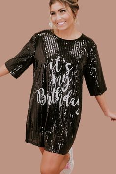 Party like it's your birthday! The It's My Birthday Sequin Dress features a round neckline, a stunning sequin design, a full lining, and the text " It's My Birthday" across the front in white. The ideal dress to accessorize and wear out on your big day! Short sleeves Round Neckline Above the knee hemline Sequin Pattern both front and back Full lining - not itchy at all Fit: oversized Fabric: 65% Polyester, 30% Cotton, 5% Spandex Imported Model Specs: Emily is wearing a size small in the photo.Ho Sequin Dresses For Bachelorette Party Season, Sequin Dress For Bachelorette Party And Party Season, Sequin Dress For Bachelorette Party, Black Sequined Celebration Dress, Black Sequined Dress For Celebration, Fitted Sequin Dress With Crew Neck, Embellished Sequin Dress For Party Season Celebrations, Black Embellished Dress For Celebration, Birthday Sequin Dress