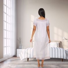 Step into a world of timeless elegance with the Alexander Del Rossa 100% Cotton Victorian Nightgown. This exquisite piece is crafted from premium cotton, ensuring breathability and comfort against your skin. Perfect for relaxed evenings at home, its vintage design adds a touch of sophistication that makes it suitable even when you have guests.

- Material: 100% Cotton
- Color: Pearl
- Size: Medium
- Gender: Female
- Features: Gathered short sleeves with wide lace cuffs, neckline trimmed with wid Feminine Cotton Nightgown For Loungewear, Cotton Lace Trim Nightgown For Home, Cotton Nightgown With Lace Trim For Home, Elegant Cotton Nightgown For Sleepover, Elegant Cotton Sleepwear For Home, Feminine Cotton Nightgown For Sleepovers, Feminine Short Sleeve Nightgown For Home, Elegant Cotton Nightgown For Bedtime, Feminine Cotton Nightgown For Hospital