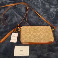 Brand New, Never Used Coach Kira Signature Canvas Crossbody Bag Comes With Detachable Adjustable Strap Coach Women's Girl's Teen's Stylish Fashion Accessories Cute Classy Classic Trendy Crossbody Bag Purse Satchel Wallet Signature Colorblock Timeless Collection Rare Discontinued Tan Rust Shoulder Leather Logo Coach Crossbody Bag With Adjustable Strap, Coach Brown Mobile Phone Bag, Coach Crossbody Mobile Phone Bag, Coach Mobile Phone Crossbody Bag, Coach Shoulder Bag For Mobile Phone, Coach Shoulder Bag With Mobile Phone Pocket For On-the-go, Coach Satchel Mobile Phone Bag, Accessories Cute, Canvas Crossbody Bag