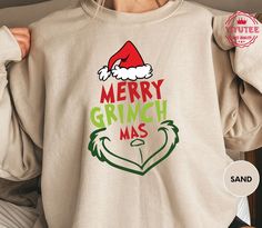 Get into the holiday spirit with our Merry Grinchmas Shirt and embrace the whimsical charm of the season. This Grinch Christmas Tee is perfect for those who love a touch of humor during the holidays. Our Holiday Shirt, designed for Women's Winter fashion, is a must-have addition to your festive wardrobe. The Holiday Tee is not just a piece of clothing; it's a statement of holiday cheer and style. Express your festive spirit with our Ugly Christmas Tee that stands out with its unique design and comfort. Shop now to elevate your seasonal style!  Etsy has it...! Please check Shirt and Sweatshirt sizes carefully.. Hi! Welcome to YiYuTee store, I'm so happy to see you here. My store's main goal is to make you happy. -We specialize in funny, customizable apparel shirts in different colors and st Womens Winter Shirts, Merry Grinchmas Shirt, Merry Grinchmas, Bah Humbug, Text Shirt, Winter Shirts, Womens Winter, Holiday Shirt, Grinch Christmas