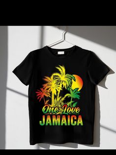 Experience the vibrant spirit of Jamaica with our 'Jamaican Sunset Serenade' shirt. This striking design features the iconic phrase 'One Love JAMAICA' set against a mesmerizing black T-Shirt. Silhouetted palm trees in the foreground and a gradient of warm, reggae-inspired colors create a visual masterpiece that captures the essence of Jamaican culture and music. With this shirt, you'll not only showcase your love for Jamaica but also immerse yourself in the island's rich heritage. Whether you're a reggae enthusiast or simply want to embrace the positive vibes of Jamaica, this shirt is a must-have addition to your wardrobe. Let the colors of the sunset and the rhythm of reggae envelop you in the 'One Love' spirit of Jamaica wherever you go. Jamaican Streetwear, Jamaica Tshirt Ideas, Jamaican Clothing, Jamaica Necklace, Jamaica Shirt, Tropical Multicolor Graphic T-shirt, Tropical Multicolor Graphic Print T-shirt, Jamaican Culture, Jamaica