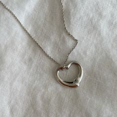 Authentic Tiffany & Co. Elsa Peretti Open Heart Necklace In Silver 22mm. In Great Condition With Minimal Marks. Original Bag Included. Silver Heart Necklace With Hallmark For Gift, Silver Heart Shaped Necklace With Hallmark, Elegant Adjustable Nickel-free Heart Necklace, Tiffany Silver Heart Necklace, Tiffany Elsa Peretti Necklace, Open Heart Necklace, Elsa Peretti, Open Heart, Original Bags