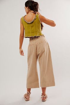 A forever-classic pair, these cool chino pants are featured in a soft cotton-linen blend and mid-rise fit with pleated detailing and cropped wide legs. **Fit:** Mid-rise, cropped wide-leg style **Features:** Cotton-linen blend, menswear-inspired tailored fit with pleated detailing, 4-pocket styling, zip-fly, belt loops at waistband **Why We ❤ It:** These classic pants add the perfect menswear-inspired touch to every outfit. | Sweet Talk Chino Pants by Free People in Tan, Size: US 8 Classic Pants, Chino Trousers, Chino Pants, Menswear Inspired, Wide Legs, Chinos Pants, Cotton Linen, Linen Blend, Mid Rise