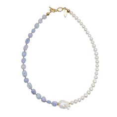 The white feshwater parls and blue lace agate short necklace is a stunning piece of jewelry that beautifully combines the soft elegance of pearls with the beautiful hues of blue lace agate. The necklace features a strand of lustrous white freshwater pearls, delicately interspersed with beautiful blue lace agate. Whether you're dressing up for a special event or just looking for a beautiful and unique piece to wear every day. With its timeless elegance and eye-catching beauty, this necklace is th Luxury Blue Pearl Pendant Necklaces, Luxury Blue Pearl Pendant Necklace, Luxury Blue Necklaces With Pearl Pendant, Luxury Blue Necklace With Pearl Pendant, Blue Baroque Pearl Jewelry With Pearl Drop, Elegant Blue Pearl Beaded Necklaces, Elegant Blue Beaded Pearl Necklace, Blue Pearl Necklace With Pearl Chain, Blue Pearl Chain Necklace