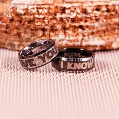 two wedding rings with the words i love you and i know so much written on them