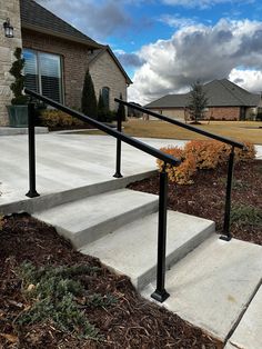 a set of stairs leading up to a house