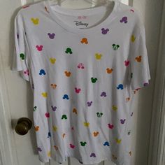 Cute Mickey Multi Color Mickey’s Never Worn Casual T-shirt For Disney Fan Events In Summer, Multicolor Disney T-shirt For Summer, Cute Tops For Disney Fan Events In Summer, Graphic Print Tops For Disney Fan Events In Summer, Summer Disney T-shirt Relaxed Fit, Disney Cotton Tops For Spring, White Disney Tops For Summer, Multicolor Graphic Print Top For Disney Fan Events, Disney Cotton T-shirt For Spring