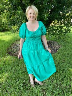 This green puff sleeve tiered midi dress is absolutely stunning for every season. With its scoop neck tie front, pockets, and elastic waist, this dress is super comfy while being incredibly classic. Wear it to work, church, brunch, running errands, date night - I mean, the possibilities are endless. Pair with wedges, fun jewelry, and make it your own! We love a blank slate dress like this! Brand: Skies are BlueDescription: Green dress with tie scoop neck; pockets; tieredFit Info: Runs a little o Slate Dress, Midi Dress Chic, Midi Dress With Pockets, Classic Wear, Puff Sleeve Midi Dress, Blank Slate, Short Puff Sleeve, Fun Jewelry, Tiered Midi Dress