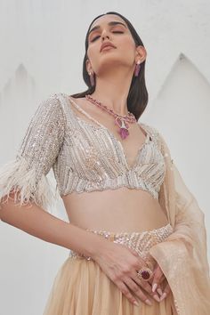 Beige can can attached flowy lehenga featuring crystal and sequin embellished waistband. Comes with padded blouse featuring cut-out and feather detail and dupatta. - Aza Fashions Flowy Lehenga, Lehenga With Dupatta, Mahima Mahajan, Sangeet Night, Lehenga Style Saree, Blouse Lehenga, Indian Bridesmaid Dresses, Crepe Blouse, Sari Blouse Designs