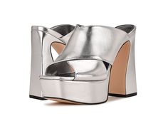 Nine West Girlz 3 - Women's Shoes : Silver : Slip into the Nine West Girlz 3 sandals to bring charming vibes to your look. Man-made upper and lining. Open round toe. Crisscross detailing on the upper. Block heels. Slip-on style. Man-made outsole. Imported. Weight of footwear is based on a single item, not a pair.