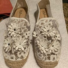 Pristine Condition White With Leather Flowers Espadrilles Size 10 B From Neiman Marcus Never Used Tags Still On Them Really A Cute Summer Shoe Trendy White Espadrilles For Vacation, Spring Synthetic Espadrilles With Flat Heel, Trendy White Espadrilles For Spring, Trendy White Spring Espadrilles, Casual White Open Toe Espadrilles, White Closed Toe Synthetic Espadrilles, Spring Slip-on Synthetic Espadrilles, White Espadrilles With Woven Sole For Spring, White Flat Espadrilles For The Beach