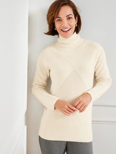 Our cozy turtleneck is a cool-weather wardrobe staple. Made from a cotton blend with cable knit texture and rib knit trim. Features TurtleneckLong SleeveHits Below HipTurtleneckPulloverStraight hemImported Fit: Misses: 27"; Petite: 25"; Plus: 29"; Plus Petite: 27" Material: 55% Cotton, 25% Rayon, 15% Nylon, 5% Wool Care: Machine Wash Cold; Only Non-Chlorine Bleach When Needed; Reshape, Lay Flat To Dry; Cool Iron If Needed | Mixed Stitch Mockneck Sweater Talbots Winter Workwear Textured Knit Turtleneck, Classic Textured Knit Turtleneck For Fall, Cozy Turtleneck With Ribbed Collar For Layering, Winter Textured Knit High Neck Turtleneck, Fitted Textured Knit Turtleneck With Funnel Neck, Cozy Textured Knit Turtleneck For Layering, Textured Knit Turtleneck With Funnel Neck, Classic Cable Knit Turtleneck For Fall, Stretch Cable Knit Turtleneck