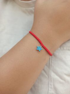 925 k high quality 18k Rose Gold plated star charm with turquoise cz diamonds.  Red string of fate, hand made snake knot woven bracelet.  Minimalist red string bracelet.  All our products are handmade in our workshop with high quality materials. We deliver with branded gift boxes.  Fast delivery.  Great gift for her, gift for mom, gift for mother, gift for girlfriend, friendship bracelets, knotted thread bracelet. Trendy Sterling Silver Charms Jewelry, Trendy Sterling Silver Jewelry With Charms, Trendy Charms Jewelry, Dainty Charm Bracelet Jewelry, Trendy Star Charm Pendant Jewelry, Minimalist Charm Bracelet Jewelry, Adjustable Turquoise Jewelry With Star Charm, Minimalist Charms Bracelet Jewelry, Minimalist Charms Bracelet