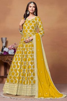 Yellow Color Jacquard Fabric Adorming Function Wear Anaraklai Suit Art Silk Anarkali Set With Chikankari Embroidery, Festive Floor-length Anarkali Set With Chikankari Embroidery, Gold Floor-length Kurta With Cutdana, Gold Floor-length Anarkali Set With Cutdana, Yellow Art Silk Anarkali Set With Chikankari Embroidery, Festive Floor-length Churidar With Chikankari Embroidery, Gold Designer Anarkali Set Maxi Length, Gold Maxi Length Anarkali Set Designer Wear, Unstitched Yellow Maxi Churidar