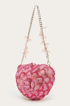 Pink heart bag crystal embellished blossom applique and golden hardware detail. Comes with a beaded handle. - Aza Fashions Luxury Heart-shaped Party Shoulder Bag, Pink Heart-shaped Evening Bag, Pink Heart-shaped Evening Shoulder Bag, Pink Embellished Top Handle Bag, Glamorous Pink Embellished Shoulder Bag, Luxury Pink Embellished Bag, Luxury Embellished Pink Bag, Pink Heart Bag, Heart Bag