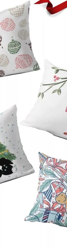 four pillows with different designs on them, one is white and the other has red ribbon