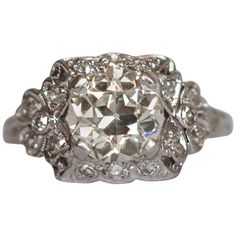 Ring Size: 6 Metal Type: Platinum [Hallmarked, and Tested] Weight: 4 grams Center Diamond Details: GIA REPORT #:2213082074 Weight: 1.68 carat Cut: Old European Brilliant Color: M Clarity: SI1 Side Diamond Details: Weight: .25 carat, total weight Cut: Antique Single Cut Color: G Clarity: VS Finger to Top of Stone Measurement: 5.5 mm Condition: Excellent Platinum Engagement Ring, Platinum Diamond Engagement Rings, Platinum Engagement Rings, Jewelry Rings Engagement, Cut And Color, Ring Verlobung, Types Of Metal, Antique Jewelry, Diamond Bracelet