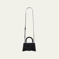 Balenciaga "Hourglass" top-handle bag in allover strass calf leather  Rolled, padded top handle Detachable, adjustable shoulder strap  Can be worn as a top handle or shoulder bag  Flap top with metal B hardware; snap closure Approx. 4.3"H x 6.7"W x 1.3"D Spot clean Made in Italy Evening Satchel With Adjustable Strap And Top Handle, Luxury Evening Bag With Adjustable Strap And Double Handle, Luxury Evening Bag With Adjustable Double Handle, Handheld Satchel With Adjustable Strap For Evening, Party Evening Bag With Top Handle And Adjustable Strap, Party Evening Bag With Adjustable Top Handle, Luxury Crossbody Satchel For Party, Evening Satchel With Adjustable Top Handle, Luxury Party Crossbody Satchel