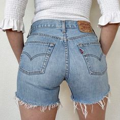 Vintage 501 Light Wash Distressed Levi's Cutoff Shorts//28" waist, 10.5" rise, 4.5" inseam, 35" upper hip, 39.5" hips, 22.5" thigh! Would fit a size 26/27 best imo, or maybe a 27 if you want them on the snugger side, but check your measurements and ask me questions. These hug your booty! They have awesome wear and fading with some distressing that adds great character! Price firm We ship internationally! SVS00420 Fitted Mid-rise Faded Bottoms, Fitted Medium Wash Straight Leg Jean Shorts, Fitted Distressed Faded Bottoms, Fitted Straight Leg Medium Wash Jean Shorts, Fitted Straight Leg Jean Shorts In Medium Wash, Fitted Straight Leg Jean Shorts With Pockets, Classic Fitted Medium Wash Jean Shorts, Fitted Mid-rise Distressed Bottoms, Fitted Distressed Jean Shorts For Spring