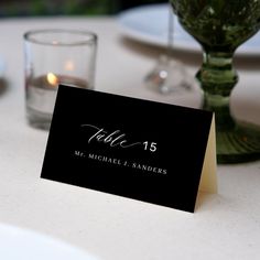 a place card sitting on top of a table