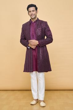 Wine jacket with sequin hand work embellishments. Comes with embroidered placket kurta and contrasting pant. - Aza Fashions Embellished Long Sleeve Bandhgala For Festivals, Hand Embellished Long Sleeve Kurta For Reception, Bollywood Style Embellished Long Sleeve Bandhgala, Embellished Bollywood Bandhgala With Long Sleeves, Traditional Fitted Embellished Outerwear, Fitted Outerwear With Intricate Embroidery For Festive Season, Embellished Bollywood Bandhgala, Fitted Traditional Embellished Outerwear, Fitted Festive Outerwear With Intricate Embroidery