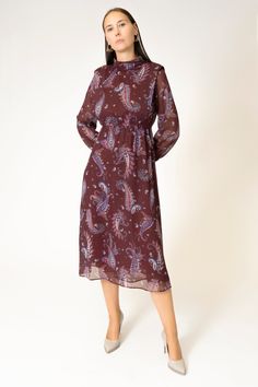 Featuring an elegant paisley print, this midi-length dress offers a chic and stylish look perfect for any occasion. The chiffon-like fabric provides a light, flowing feel, enhancing its graceful silhouette. Finished with a mock neckline, this dress effortlessly combines comfort with refined elegance. Fabric Content: 100% POLYESTER Label Size Numeric Size Bust Waist Hips XS 0-2 32 22 32 S 4-6 34 24 34 M 8-10 36 26 36 L 12-14 38 28 36 XL 14-16 40 30 44 Mango Dress, Paisley Print Dress, Smart Dress, Chiffon Midi Dress, Chiffon Long Sleeve, Dress Shapes, Long Sleeve Midi, Midi Length Dress, Printed Midi Dress