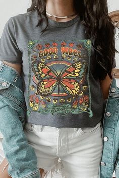 Spread good vibes with our Butterfly Graphic Tee! Made with high quality materials and a stylish design, this tee will make a statement wherever you go. The butterfly graphic adds a touch of beauty and positivity to your wardrobe. Feel good and look good with our Good Vibes Graphic Tee! Unisex Crew Neck Short Sleeve .High Quality Direct To Film Printed Graphic Design.100%COTTON,HEATHER(52%COTTON,48%POLY),ATH.HEATHER,BLACK HEATHER(90%COTTON,10%POLY) Good Vibes Graphic, Concert Festival, Butterfly Graphic, Romper And Jacket, Fall Denim, Film Prints, Graphic Design Print, Knitted Coat, Kimono Cardigan