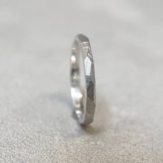 Faceted Argentium Silver Stacking Ring - 2mm Industrial Rough Textured Band - Geometric Minimalist - 935 - Engraved Inside - Men or Ladies This dainty 2mm wide stacking ring is handmade out of Argentium silver. Argentium Silver is a higher grade of silver than traditional sterling silver, offering much better tarnish resistance as well as being harder and more durable. Argentium silver is an alloy containing 93.5% fine silver (1% higher silver content than standard sterling silver). Argentium si Wide Silver Band, Faceted Design, Traditional Diamond, Silver Stacking Rings, Wide Rings, Argentium Silver, Large Ring, Personalized Rings, Steel Ring