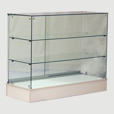 an empty display case with glass shelves on the bottom and bottom, in front of a white background