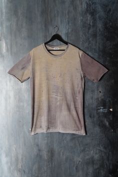 Naturally dyed cotton top. Loose fit dystopian long t-shirt. Seamless sleeves and bottom. Fabric is hand dyed using organic plant matter. Each piece is dyed individually and no two can ever be the same. One size Measurements: Chest: 120 cm / 47.2'' Waist: 114 cm / 44.9'' Shoulders: 56 cm / 22'' Sleeve: 30 cm / 11.8'' Length: 86 cm / 33.8'' One of the kind top! #127 Pre-washed Washed Black Crew Neck Top, Washed Black Pre-washed Crew Neck Top, Grunge Tie Dye Cotton Top, Unisex Acid Wash Cotton Tops, Tie-dye Cotton Tops, Faded Grunge Style Pre-washed T-shirt, Short Sleeve Cotton T-shirt With Natural Dye, Faded Grunge Pre-washed T-shirt, Grunge Style Pre-washed Cotton Top