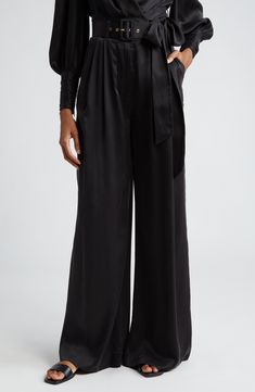 Bask in the glow of pure silk in these pleated high-waist pants cut with flowy wide legs and cinched with a buckled belt. 33" inseam; 30" leg opening; 14" front rise; 17" back rise (size 4US) Zip fly Front slant pockets Removable belt 100% silk Dry clean Imported Designer Clothing Belted High Waist Bottoms For Date Night, Elegant Silk Bottoms For Date Night, Elegant Spring Wide Leg Pants With Tie Waist, Elegant Wide Leg Pants With Tie Waist For Spring, High-waisted Silk Wide Leg Pants For Evening, Silk High-waisted Wide Leg Pants For Evening, Silk High-waisted Wide Leg Evening Pants, Chic High-waist Evening Culottes, Chic Belted Bottoms For Date Night