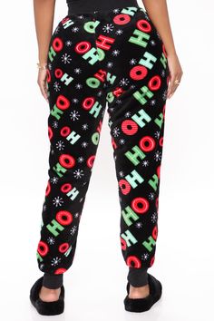 Available In Black/combo. Plush PJ Leggings Perfect For The Holidays! Wide Leg Pant Drawstring Waist Ho Ho Ho Print Full Stretch Disclaimer: Print Placement Will Vary Final Sale 100% Polyester Imported | Ho Ho Ho Plush PJ Joggers in Black size X-Large by Fashion Nova Stretch Black Bottoms For Christmas, Black Bottoms For Christmas Loungewear, Black Christmas Loungewear Bottoms, Black Loungewear Bottoms For Christmas, Casual Black Pants For Christmas, Pj Leggings, Lingerie Accessories, Wide Leg Pant, Print Placement